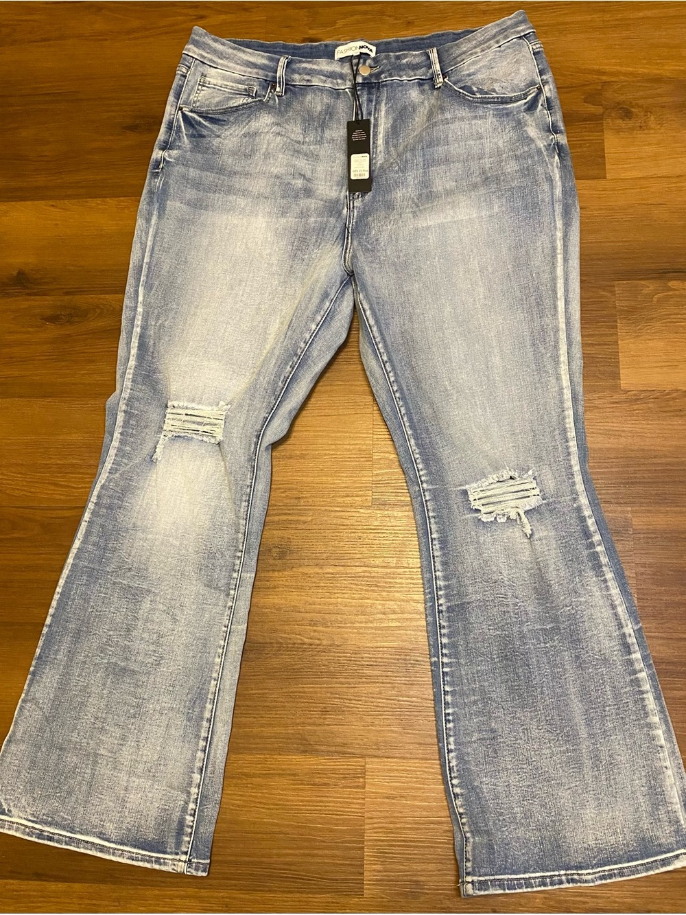 Fashion Nova Light Blue Distressed Flare Jeans